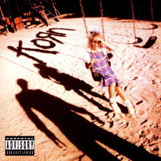 Обложка альбома Korn, Музыкальный Портал α